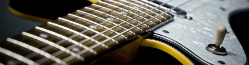 Zoom sur un manche de guitare électrique